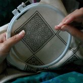 What"s the distinction between embroidery and needlepoint?